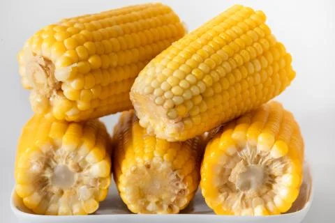 Some corn cooked very soft, hot and yellow. Stock Photos