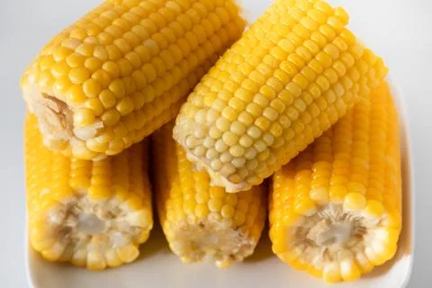 Some corn cooked very soft, hot and yellow. Stock Photos
