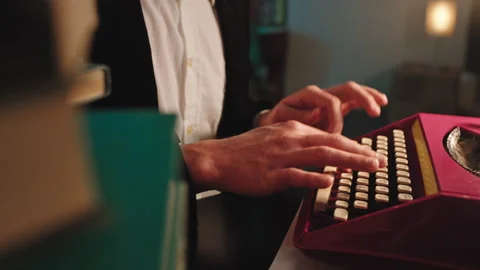 Some details closeup guy type some text on the retro typewriter in the library Stock Footage 135596611
