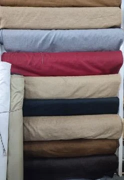 Some different colours of sofa and curtains cloths rolls Stock Photos