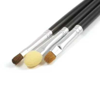 Some different kind of make-up brushes isolated on white Foto stock