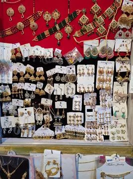 Some different type of asian artificial golden ear rings Stock Photos