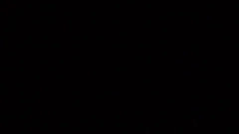 Some dust of liquid particles flowing on dark background Stock Footage 75099021