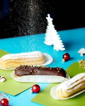 Some eclairs with various topping Stock Photos