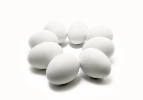 Some eggs on white Stock Photos