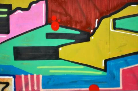 Some elements of a large and composite graffiti pattern on the wall, made wit Stock Photos