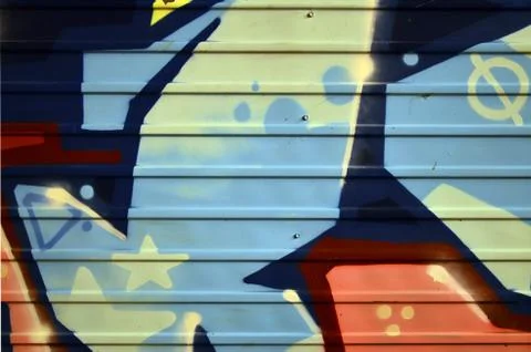 Some elements of a large and composite graffiti pattern on the wall, made wit Stock Photos
