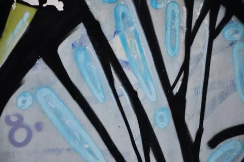 Some elements of a large and composite graffiti pattern on the wall, made wit Stock Photos