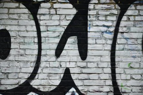 Some elements of a large and composite graffiti pattern on the wall, made wit 写真素材