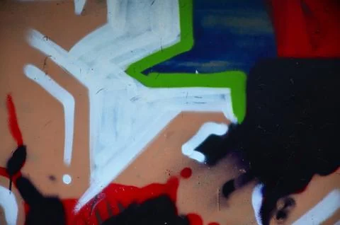 Some elements of a large and composite graffiti pattern on the wall, made wit Stock Photos