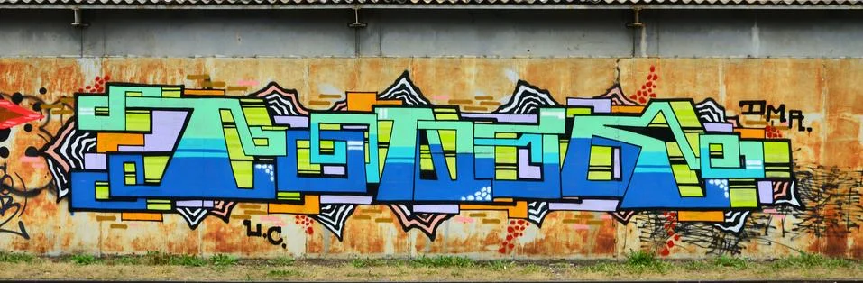 Some elements of a large and composite graffiti pattern on the wall, made wit 스톡 사진