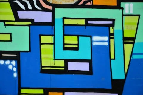 Some elements of a large and composite graffiti pattern on the wall, made wit Stock Photos