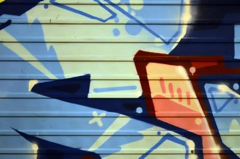 Some elements of a large and composite graffiti pattern on the wall, made wit Stock Photos