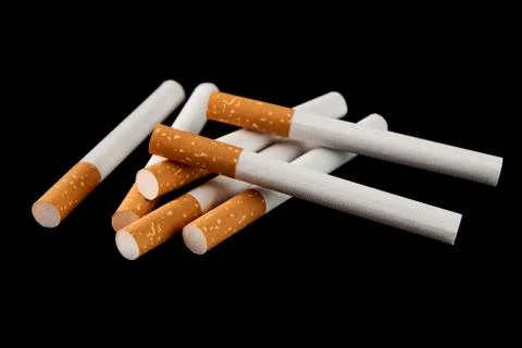 Some filter cigarettes isolated on black background Stock Photos