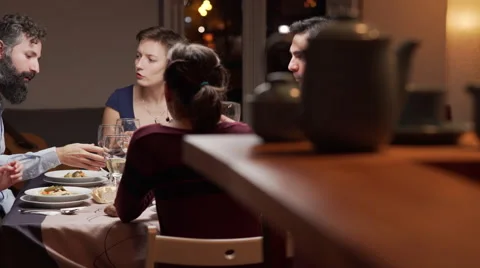 Some friends enjoy a dinner Stock Footage 46463455