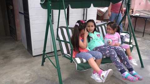 Some girls messing on a swing Stock Footage 143347465