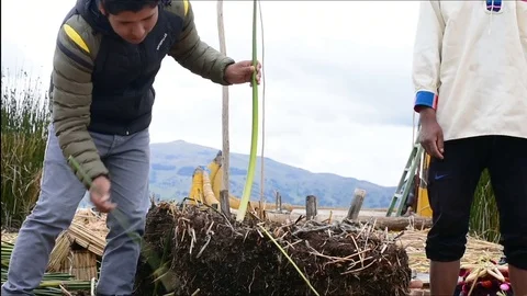 Some indigenous people explain their culture in Uros in Peru Video stock 79562963