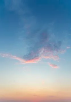 Some light clouds in the light of a sunset, for backgrounds Stock Photos