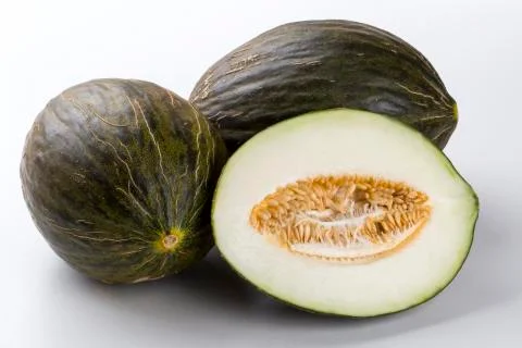 Some melons over a white background. Stock Photos