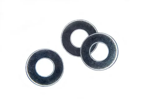 Some metal washers on a white background Foto stock