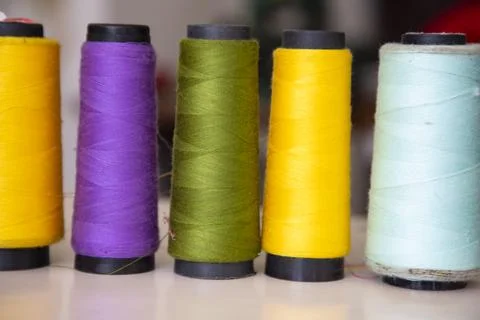 Some multicolor Spools of  swings thread Close-up Focus Stock Photos
