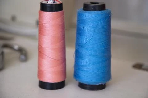 Some multicolor Spools of  swings thread Close-up Focus Stock Photos