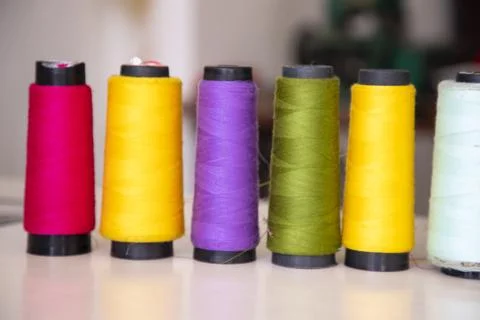 Some multicolor Spools of  swings thread Close-up Focus Stock Photos