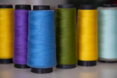 Some multicolor Spools of  swings thread Close-up Focus Stock Photos