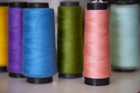 Some multicolor Spools of  swings thread Close-up Focus Stock Photos