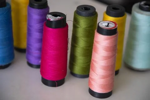 Some multicolor Spools of  swings thread Close-up Focus Stock Photos