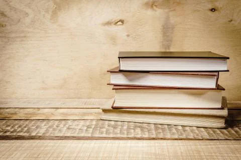 Some old books on the table Stock Photos