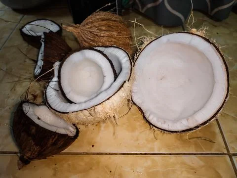 Some old coconuts that have been split Stock Photos