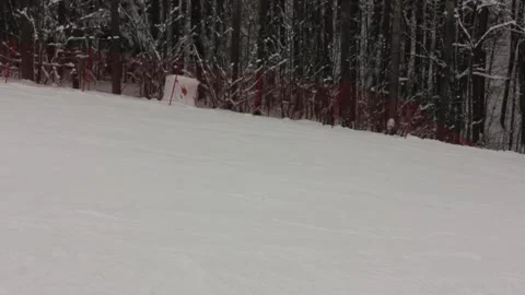 Some people are skiing down the pass at the ski resort Stock Footage 146638743