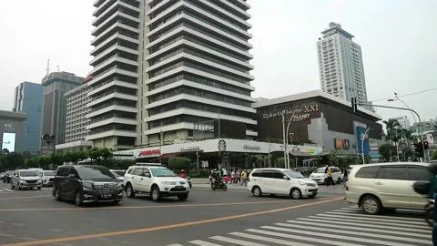 Some people walking on the sidewalk Stock Footage 211650397