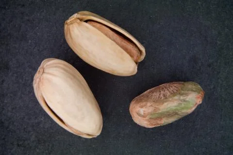 Some Pistachios on a Slate Plan viewed from above Stock Photos