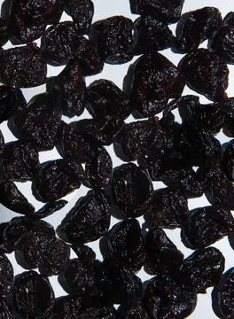 Some prunes with white background Stock Photos