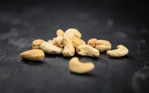  Some roasted Cashew Nuts (close up; selective focus) Some roasted Cashew ... Foto stock