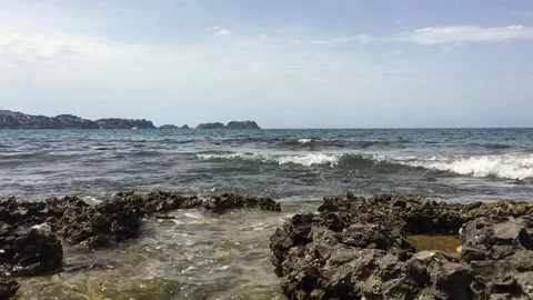 Some rocks at balearic sea Stock Footage 71771372