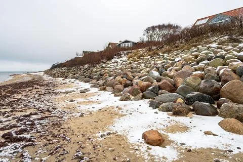 Some rocks on the beach in Dronningmlle Stock Photos