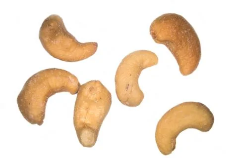 Some salted cashews on a white background Stock Photos