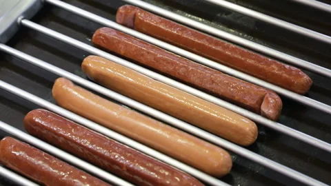 Some sausages on the grill Stock Footage 85737448