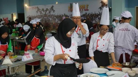 Some student cook in the class Stock Photos
