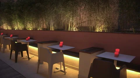 Some tables in the courtyard of a hotel Stock Footage 61774998
