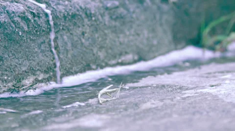 Some water passing on corner Stock Footage 37986212