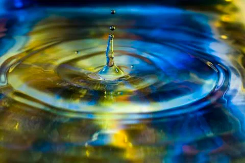 Some water's drops falling Stock Photos