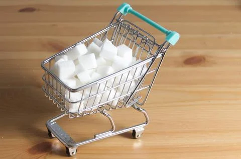 Some white sugar cubes Stock Photos