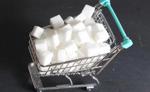 Some white sugar cubes Stock Photos