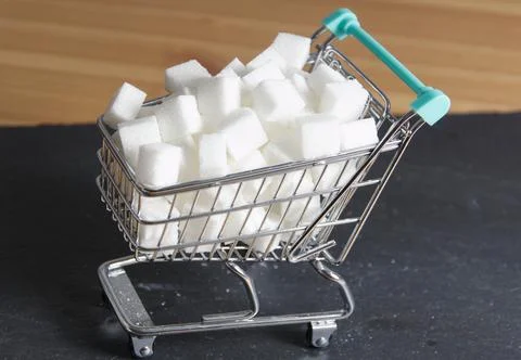 Some white sugar cubes Stock Photos