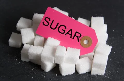 Some white sugar cubes Stock Photos