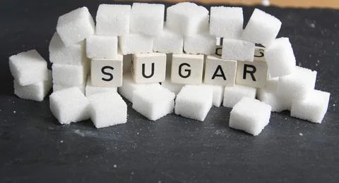 Some white sugar cubes Stock Photos